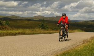 Barbara cycling to John O' Groats